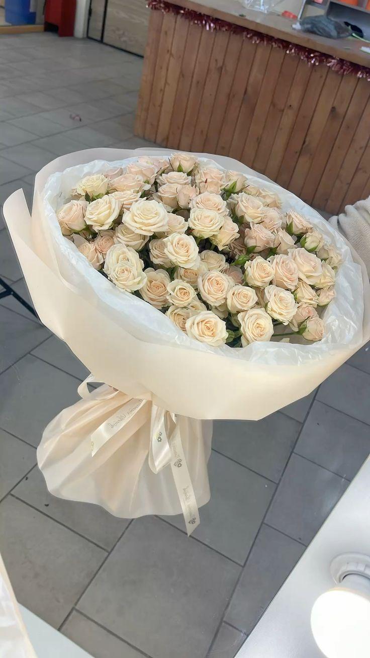 Professional floral arrangement in modern corporate setting